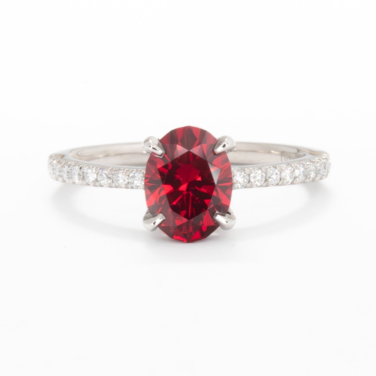 rumi engagement ring with oval lab ruby