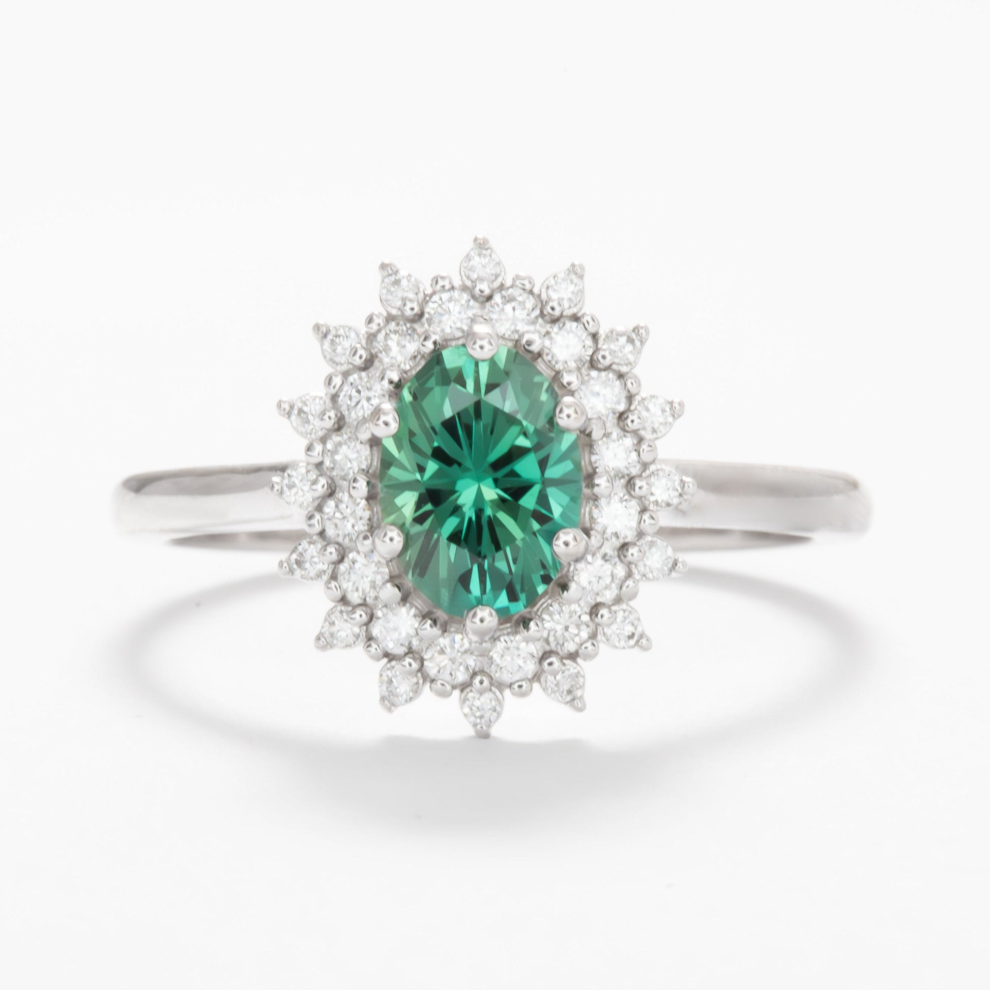 sabela double halo engagement ring with oval green lab sapphire