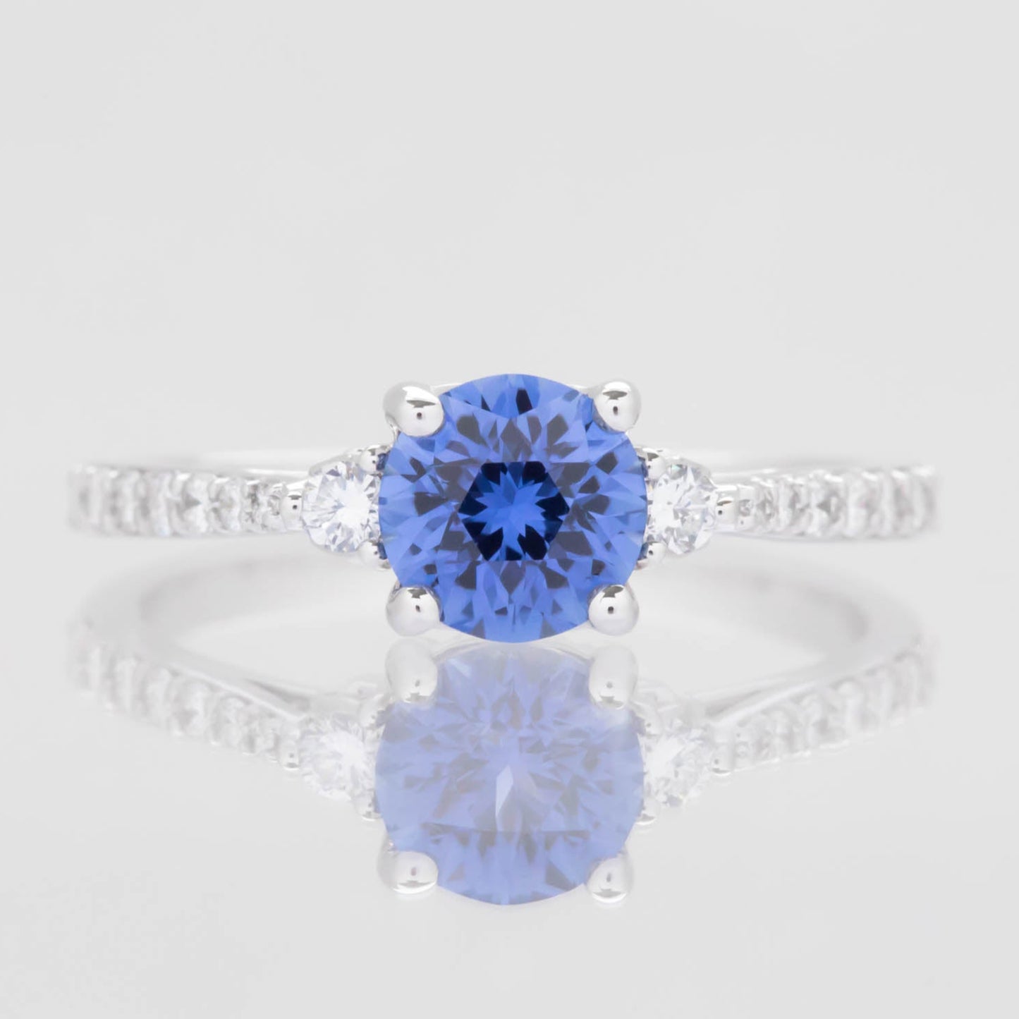 stacy engagement ring with periwinkle blue lab sapphire