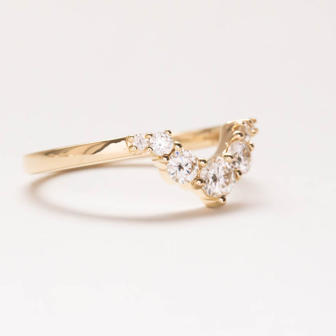 stella yellow gold wedding band with moissanite