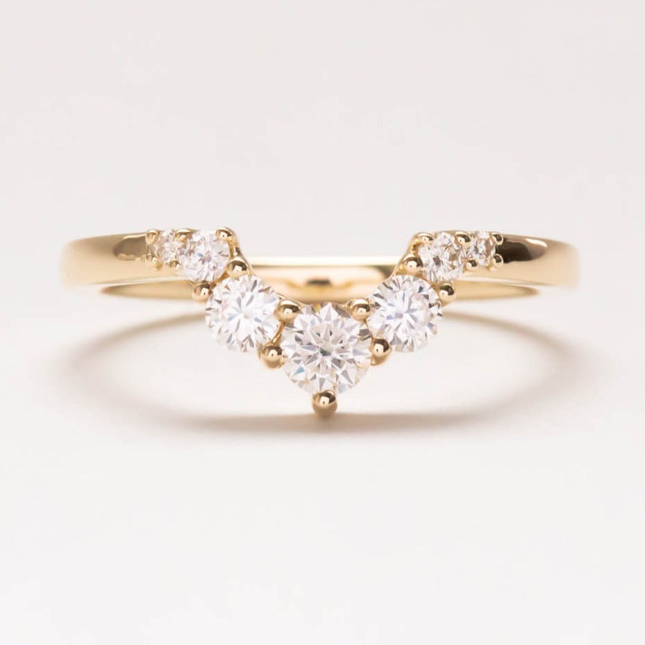 stella yellow gold wedding band with moissanite