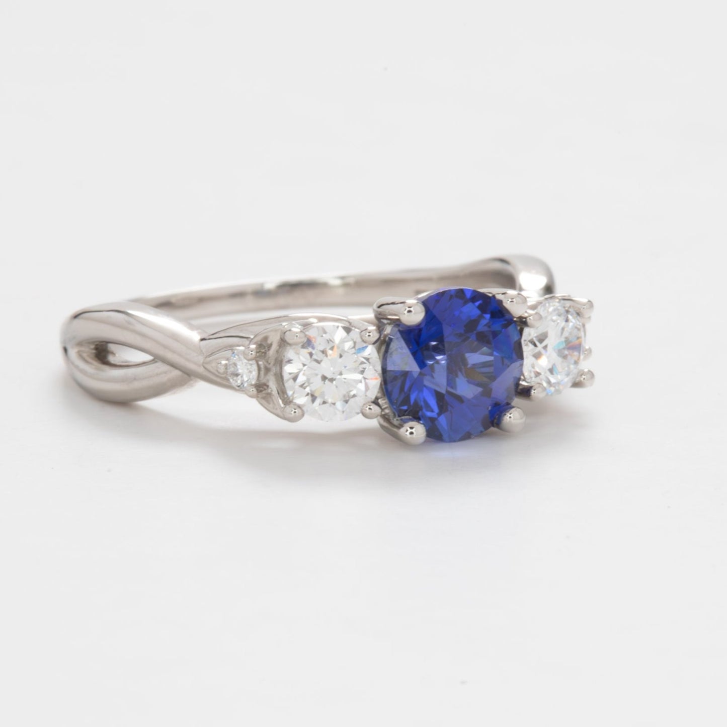 tana 3 stone engagement ring with blue lab sapphire (1)