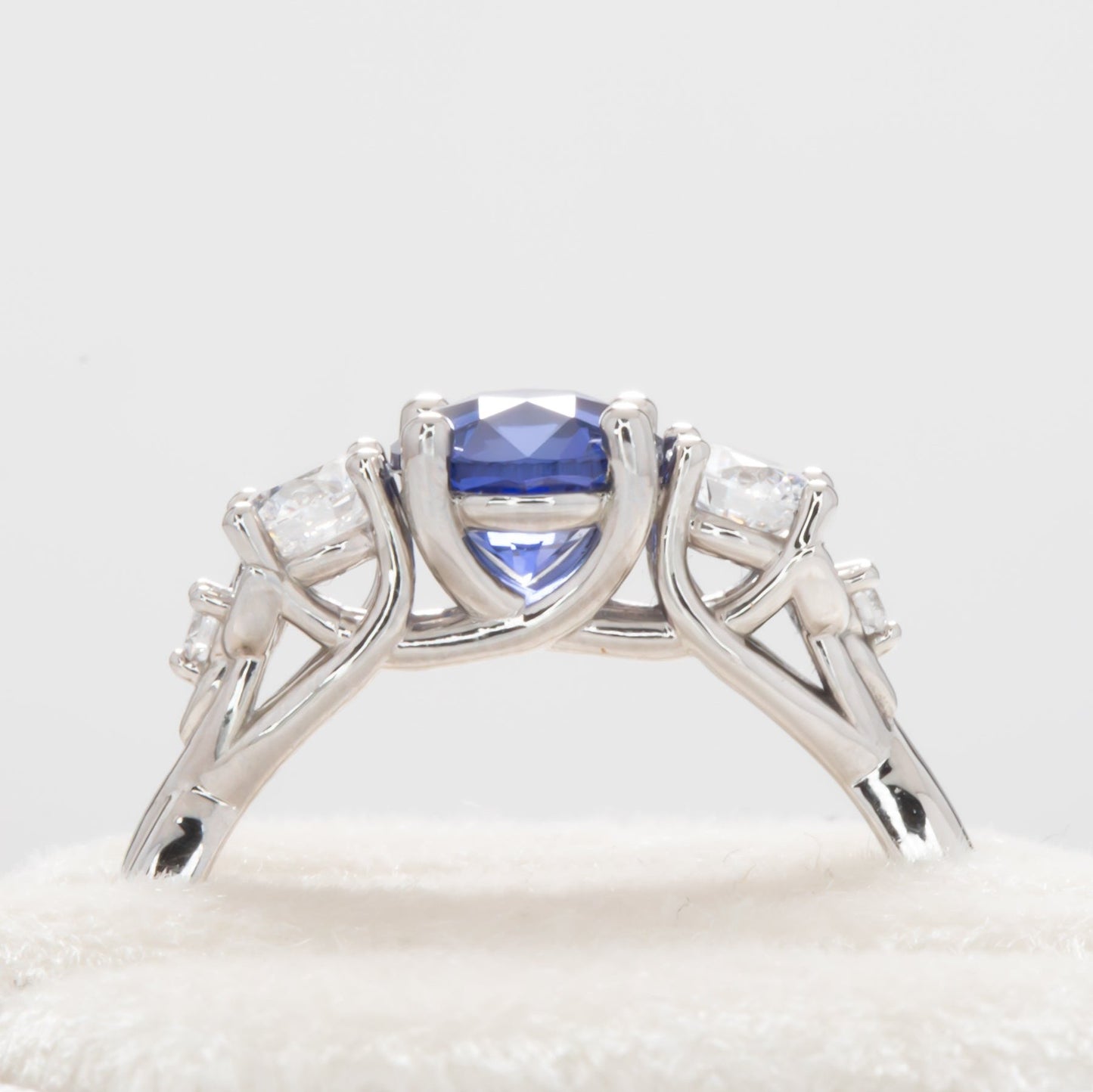 tana 3 stone engagement ring with blue lab sapphire (1)