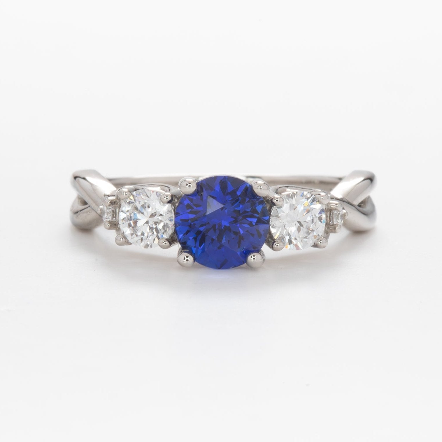 tana 3 stone engagement ring with blue lab sapphire (1)