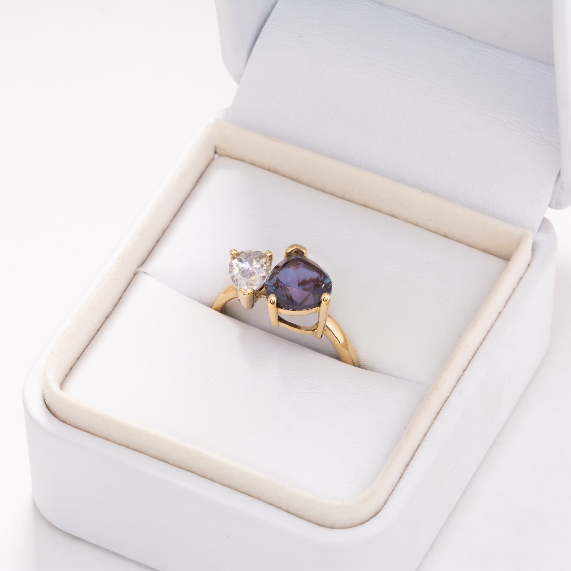 toi et moi ring with pear lab alexandrite and pear moissanite