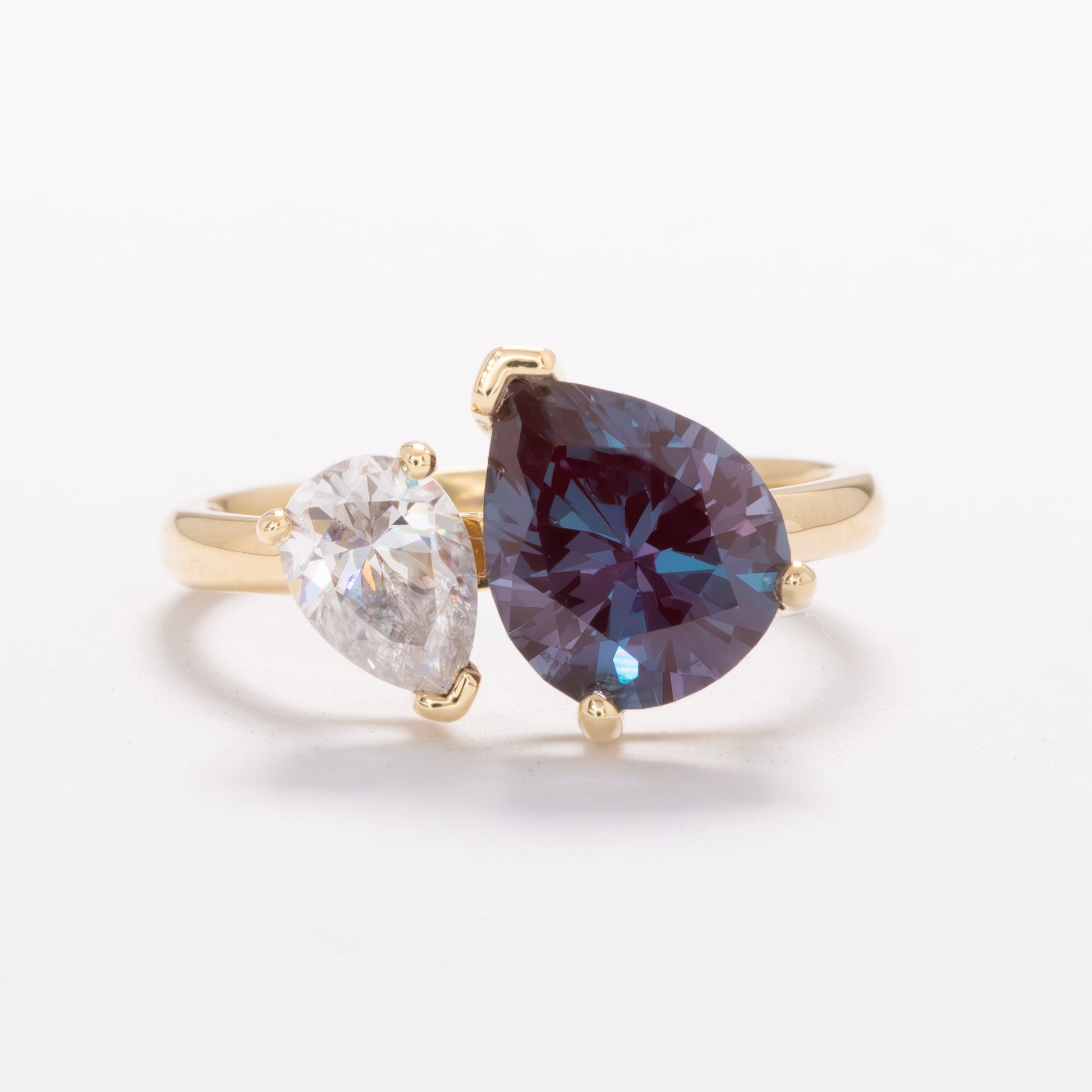 toi et moi ring with pear lab alexandrite and pear moissanite