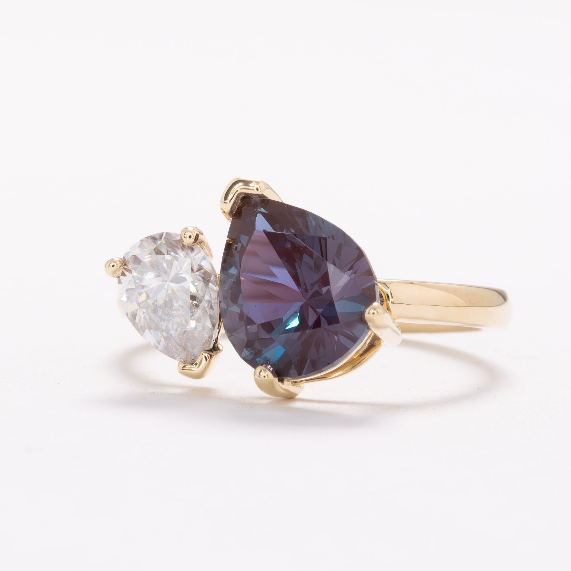 toi et moi ring with pear lab alexandrite and pear moissanite