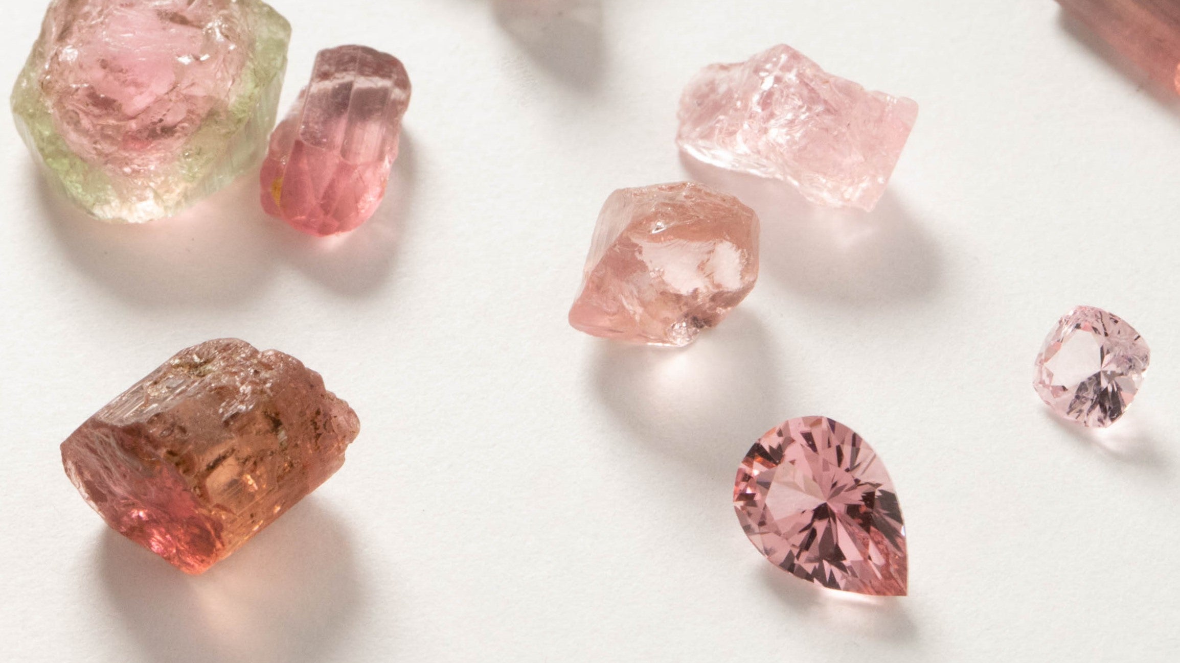 cut and rough pink tourmaline