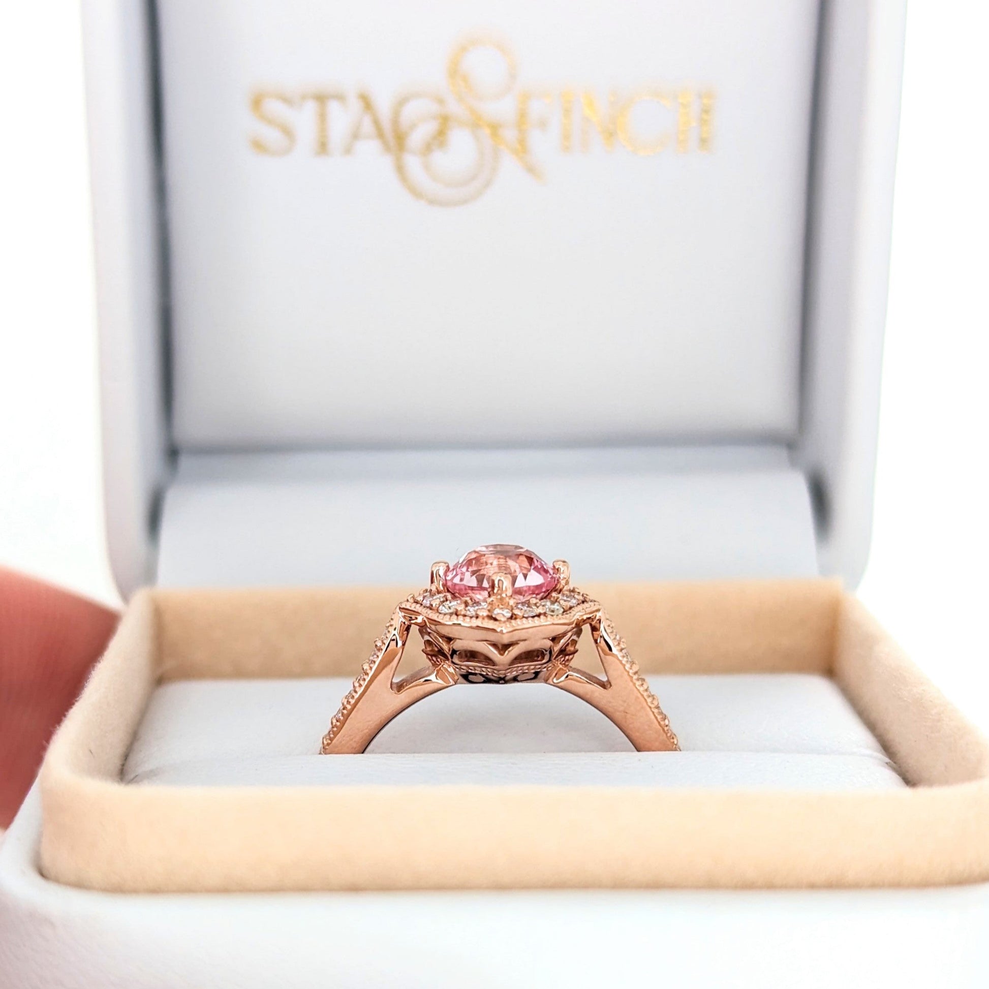 violet engagement ring with peach lab sapphire round in rose gold