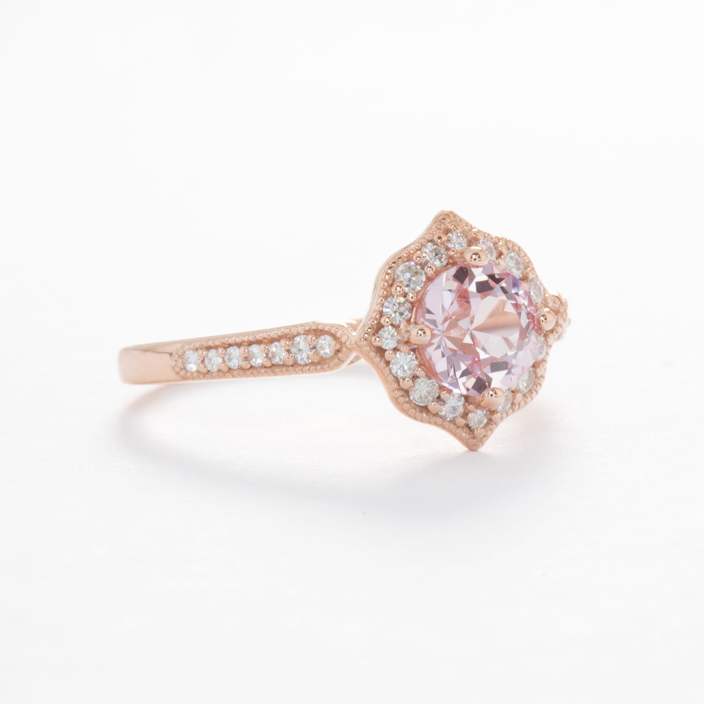 violet engagement ring with peach lab sapphire round in rose gold